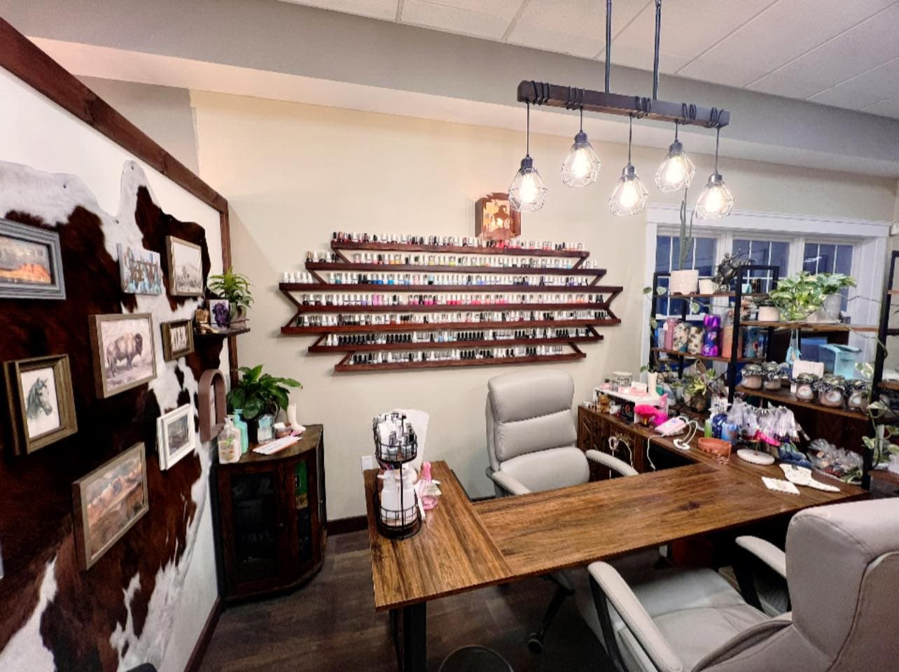 Nail floor with full-wall polish display and industrial lighting